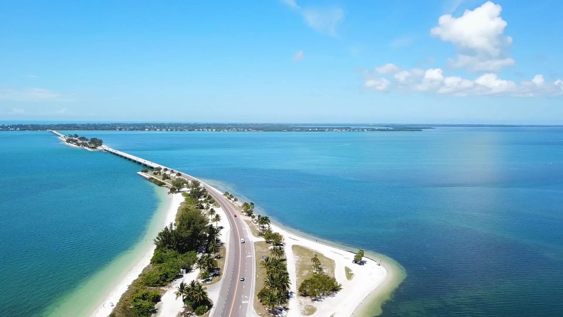 Aerial view of the Sanibel Causeway crossing the Gulf toward the island